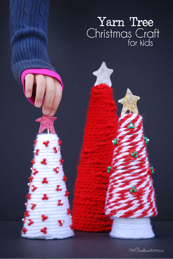 Yarn Tree Christmas Craft for Kids {OneCreativeMommy.com} Have fun creating together, and then display your project every year! Christmas Decor and Kids Craft Idea