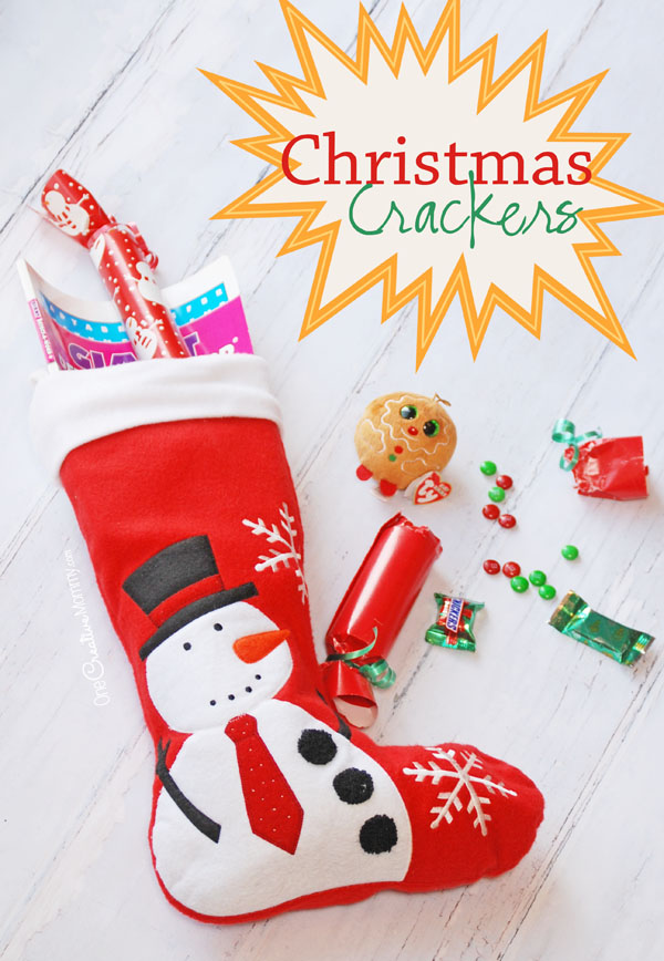 Too much candy in the Christmas stocking because Santa is trying to give to give the kids all of their favorites? Mix it up (literally). Try these adorable Christmas Crackers Stocking Stuffers! {OneCreativeMommy.com} Simple tutorial