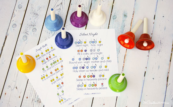 Our newest Christmas tradition--handbells! Download printable Christmas handbell music for 5 popular carols to start your own family tradition today. {OneCreativeMommy.com}