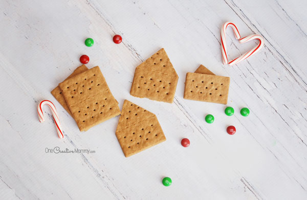 How to cut graham crackers without breaking them! Perfect for Gingerbread houses {OneCreativeMommy.com}