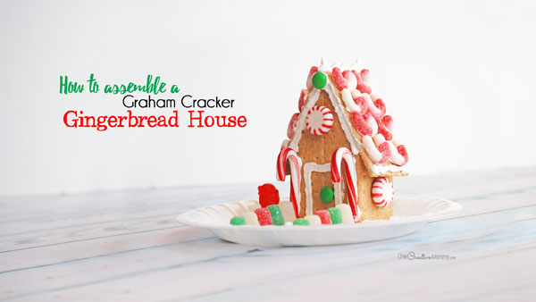 Who knew building a Gingerbread House could be so simple? Great tutorial (including video) to build a house from Graham Crackers. {OneCreativeMommy.com}