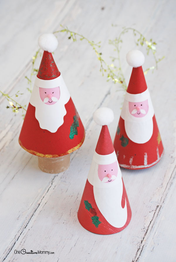 I'm definitely making these paper cone Santas with my kids this year! {OneCreativeMommy.com} Christmas Kids Crafts #sponsored