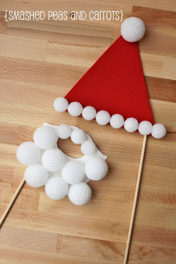 Santa Disguise Photo Props from Smashed Peas and Carrots {Featured in 25 Amazing Santa Claus Christmas Crafts on OneCreativeMommy.com}